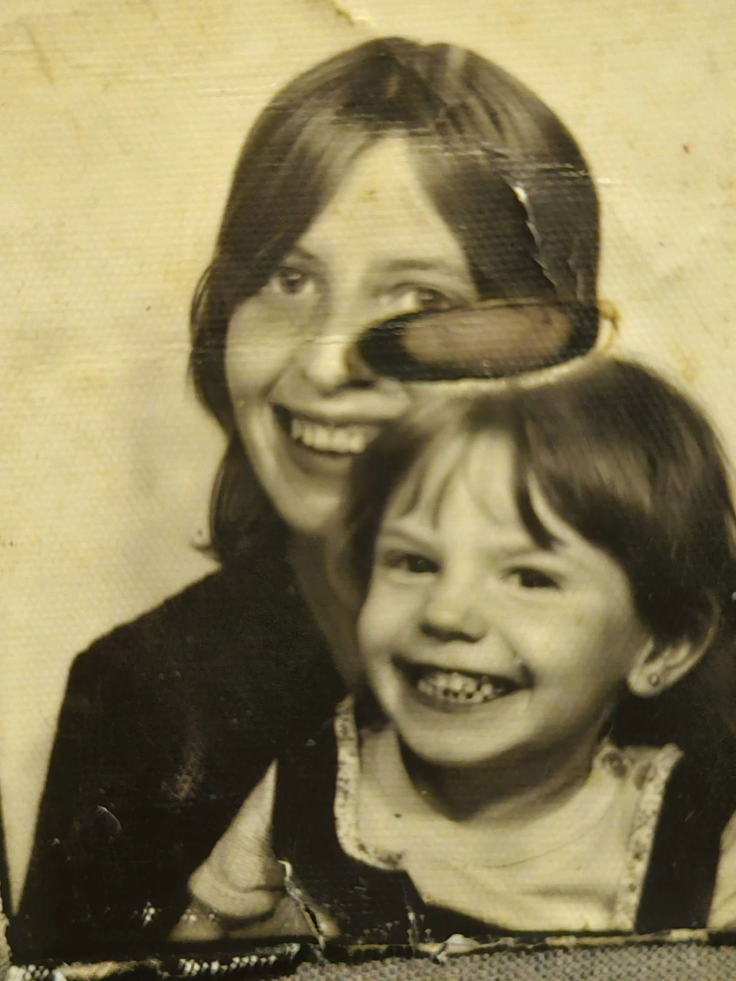 Damaged photo — before